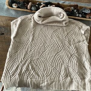 The limited sleeveless sweater